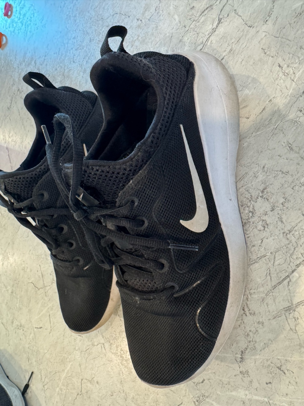 Nike Black Mesh Sneakers with White Swoosh